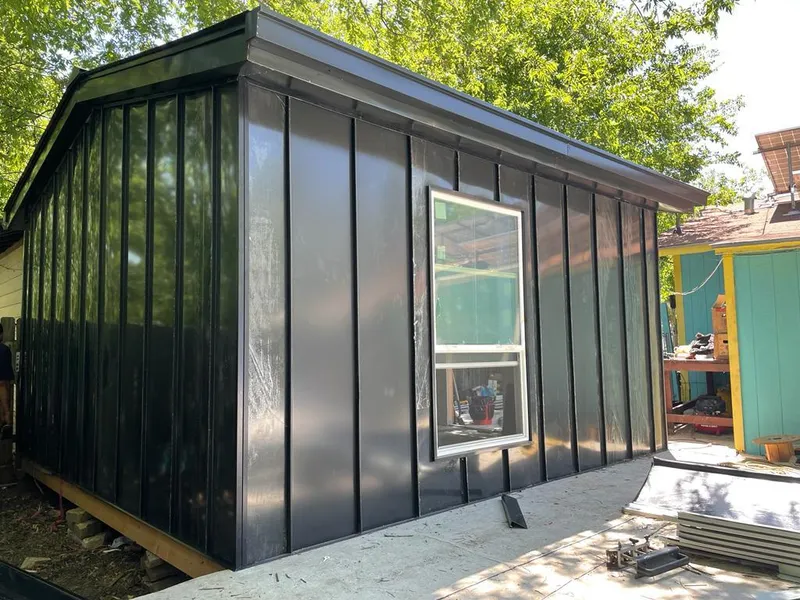 Black standing seam metal wall panels for Roof Inspection in High Point