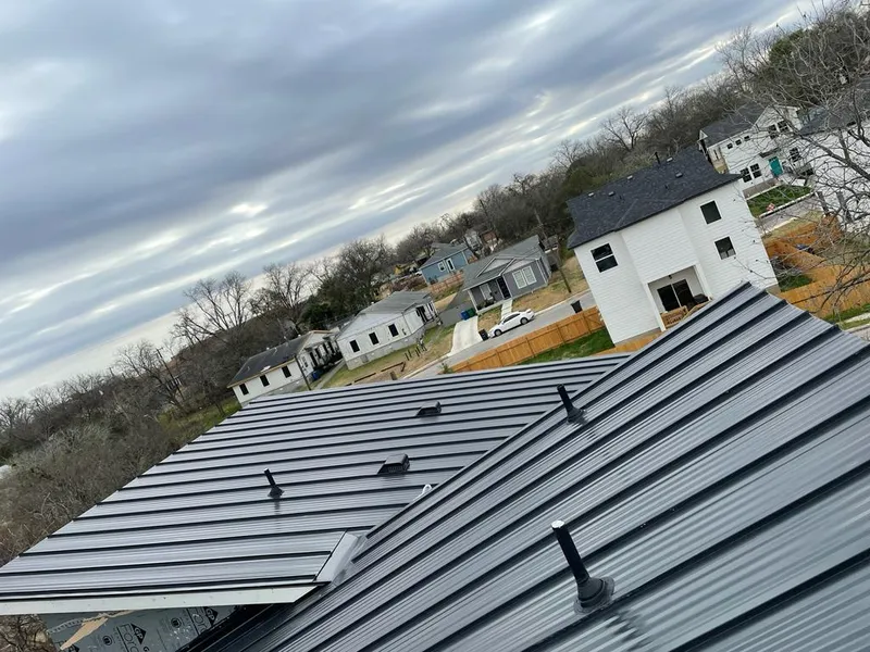 Standing seam metal roof panels with vents for Skylight Repair in High Point